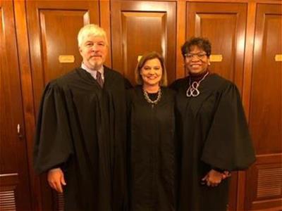 Judge Sheehan pictured with Justices Donnelly and Stewart