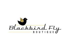 graphic of a black bird with a script that says Blackbird Fly