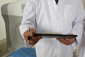 doctor holding patient notes