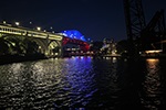 Abridgespanoverwateratnightisilluminatedinredwhiteandbluelighting