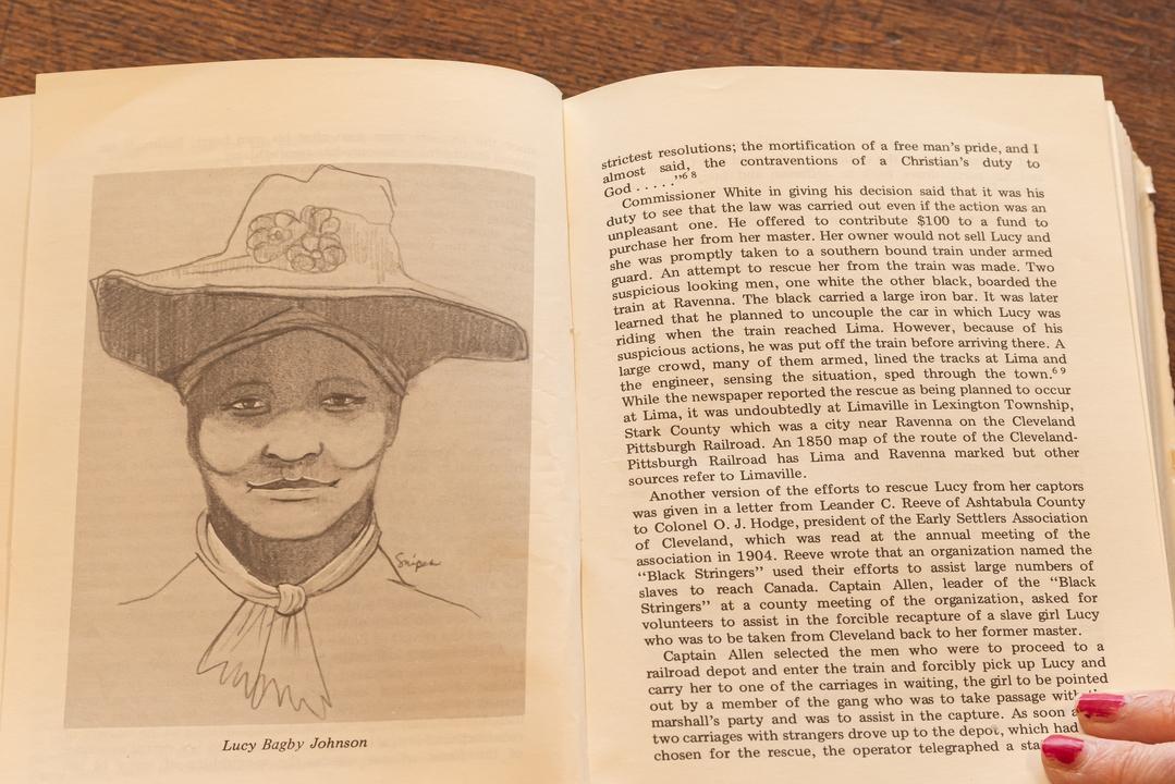 Portrait of Bagby in a book