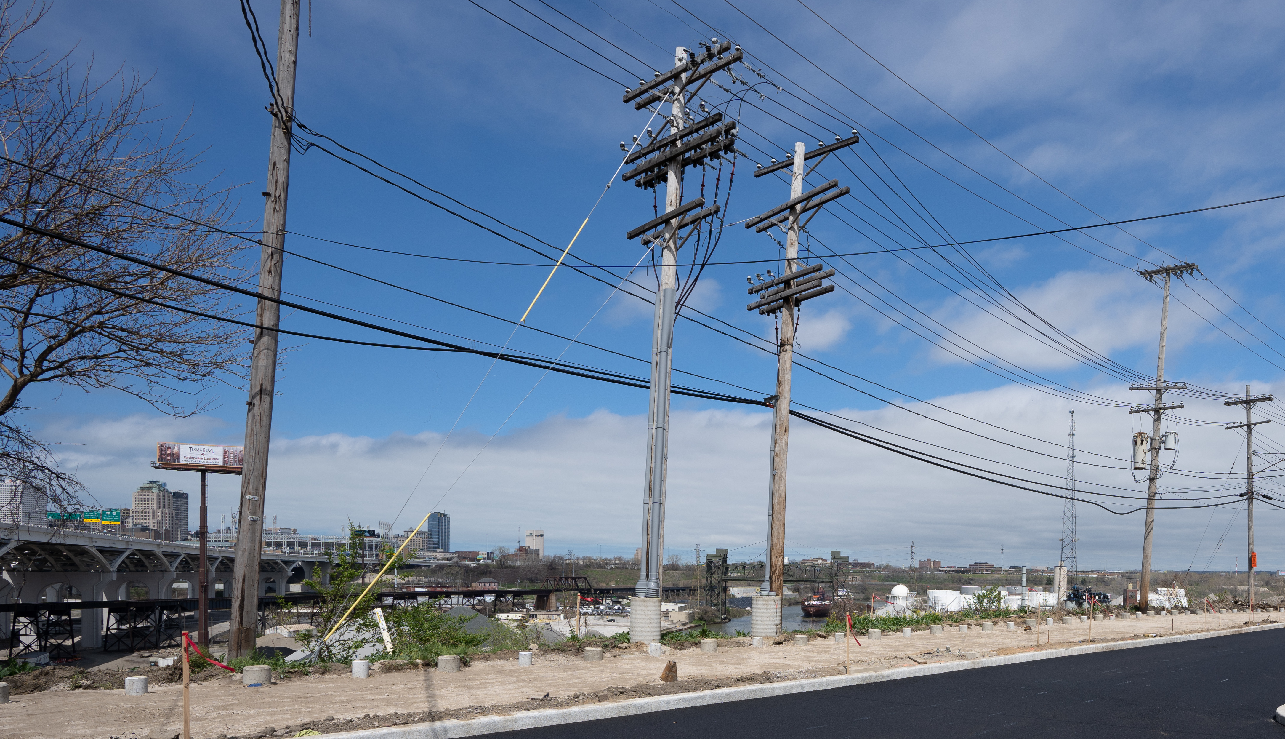 Utility lines with the Cleveland skyline in the background