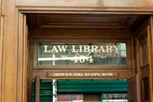 wooden door with words Law Library on window