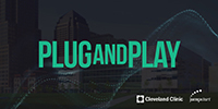 image of the city in the background and the words Plug and Play in green