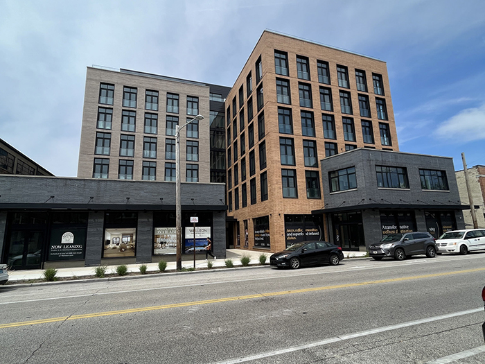 The Welleon located in Gordon Square in the City of Cleveland incorporates retail and housing with public spaces along the major 26 bus route.