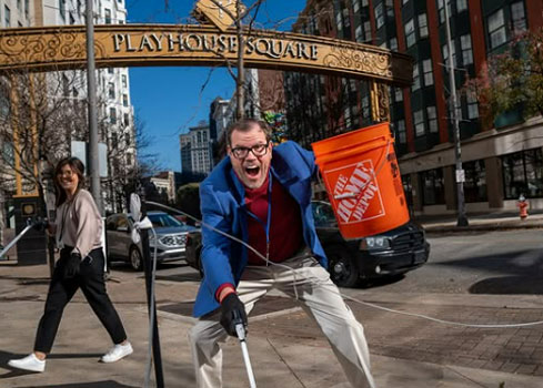 Law Director Richard D. Manoloff cleaning up litter around Cuyahoga County with his team.