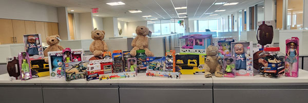 A large assortment of kids toys and stuffed animals to be donated to children for the holidays.