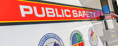 Side of emergency vehicle that says Public Safety and shows county logo.