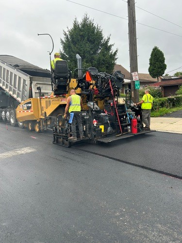 Construction crew on road.