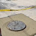 Closeupofseweronstreetwithconstruction