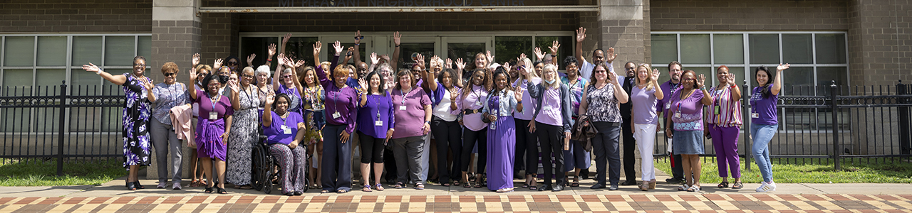 group of people wearing purple for Elder Abuse Awareness