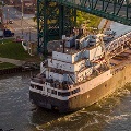 AboatpassingunderabridgeontheCuyahogaRiver