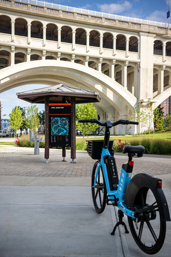 An e-bike in front of Canal Park Bridge
